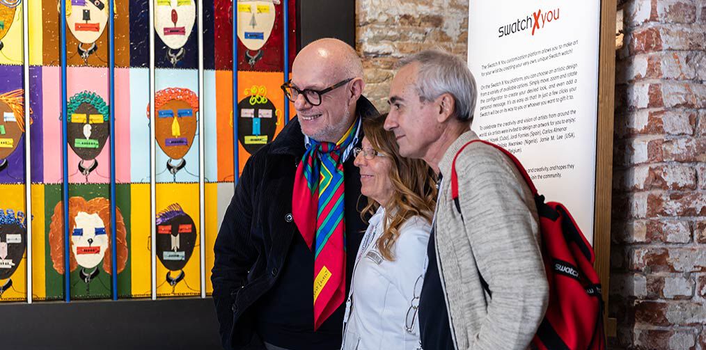 3 people inside a gallery room at La Biennale Arte 2022